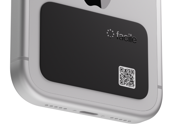 Facile card attached to the back of an iPhone, ready to tap